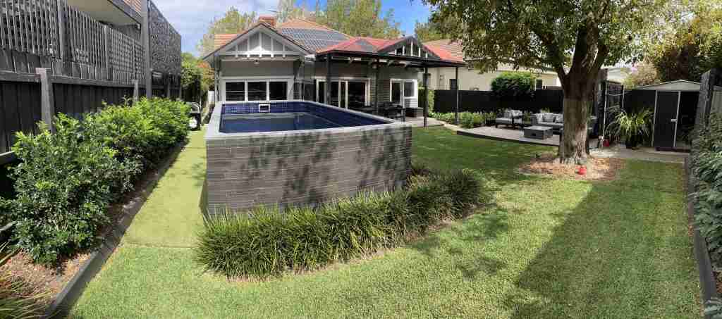 Swimco Aquatics award-winning composite pool over $60,000 in Melbourne, featuring a custom-designed above ground concrete plunge pool with a height of 1200mm, detailed step and fence access, two separate decks, and beautiful landscaping, perfect for year-round outdoor entertaining - SPASA 2023 VIC Best Composite Pool Winner.